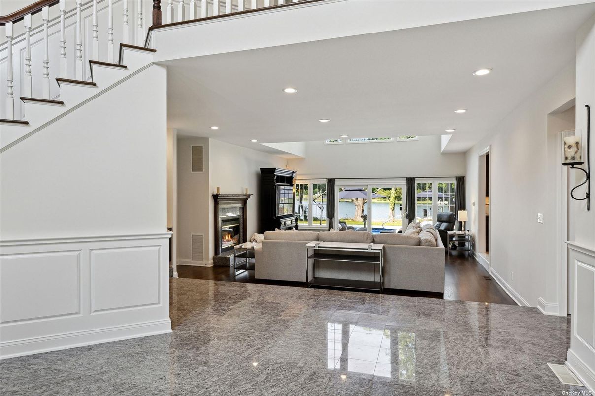 Fireplace, Interior, Living room, Recessed Lighting, Water, Wood Texture Flooring