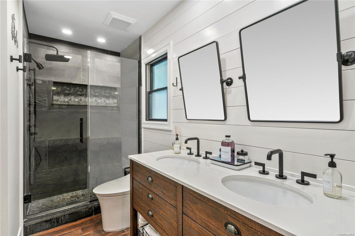 Bathroom, Dual Sink Vanities, Glass Shower, Interior, Recessed Lighting, Wood Texture Flooring