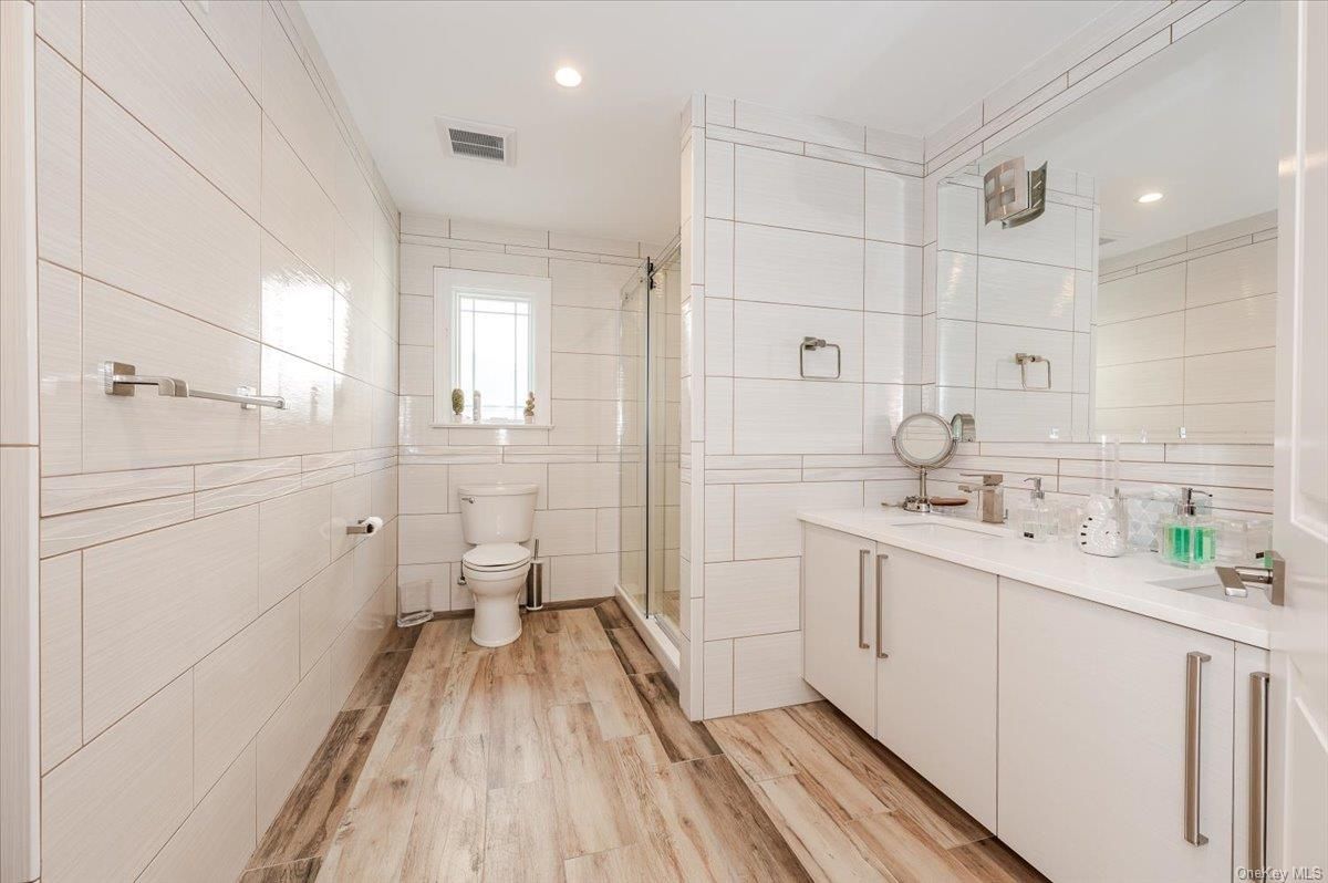 Bathroom, Glass Shower, Interior, Recessed Lighting, Wood Texture Flooring