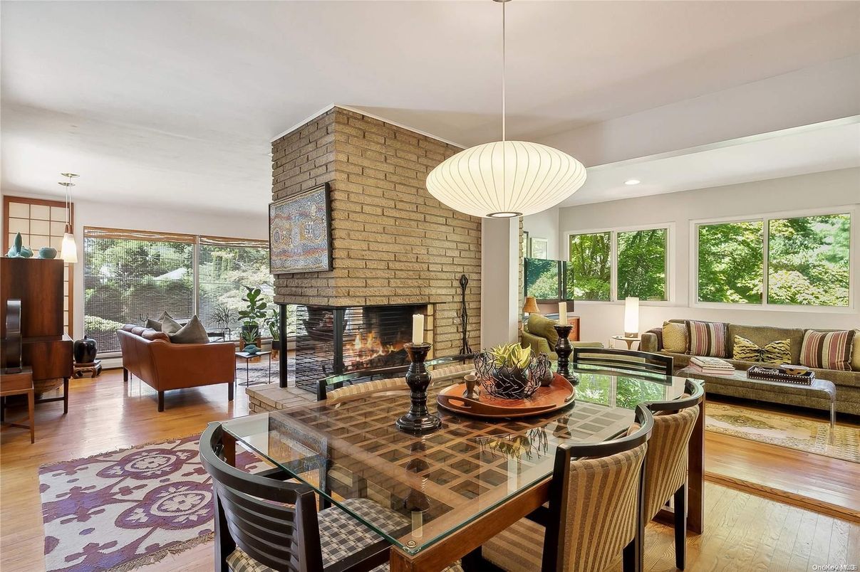 Dining room, Fireplace, Interior, Living room, Pendant Lights, Recessed Lighting, Stone Walls, Wood Texture Flooring