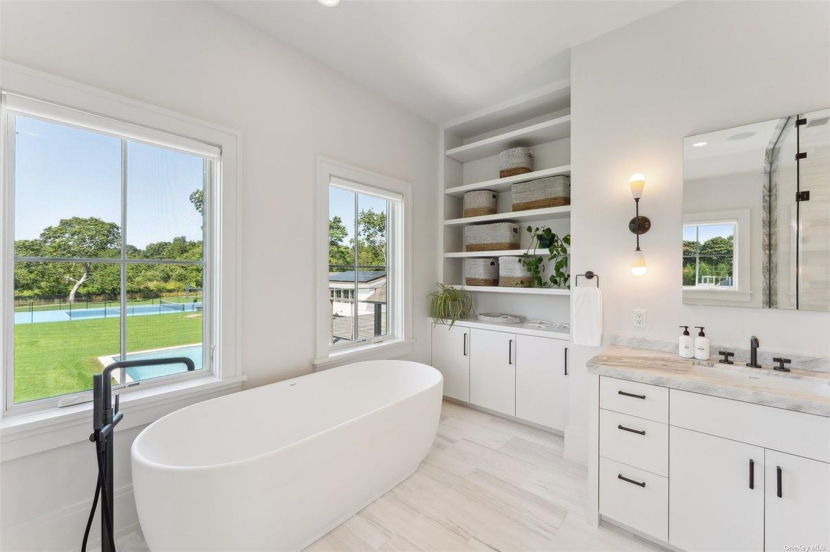Bathroom, Dual Sink Vanities, Free Standing Baths, Interior, Recessed Lighting, Wood Texture Flooring