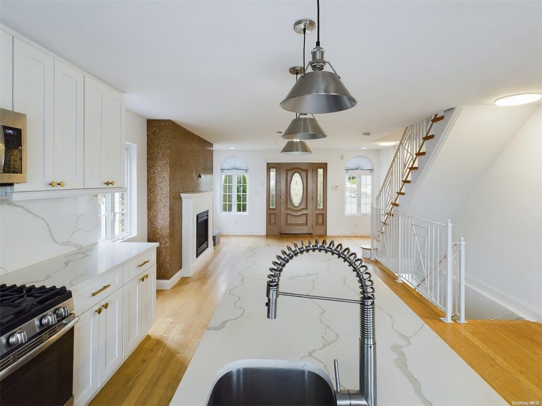 Fireplace, Interior, Kitchen, Pendant Lights, Stainless Steel Appliances, Wood Texture Flooring