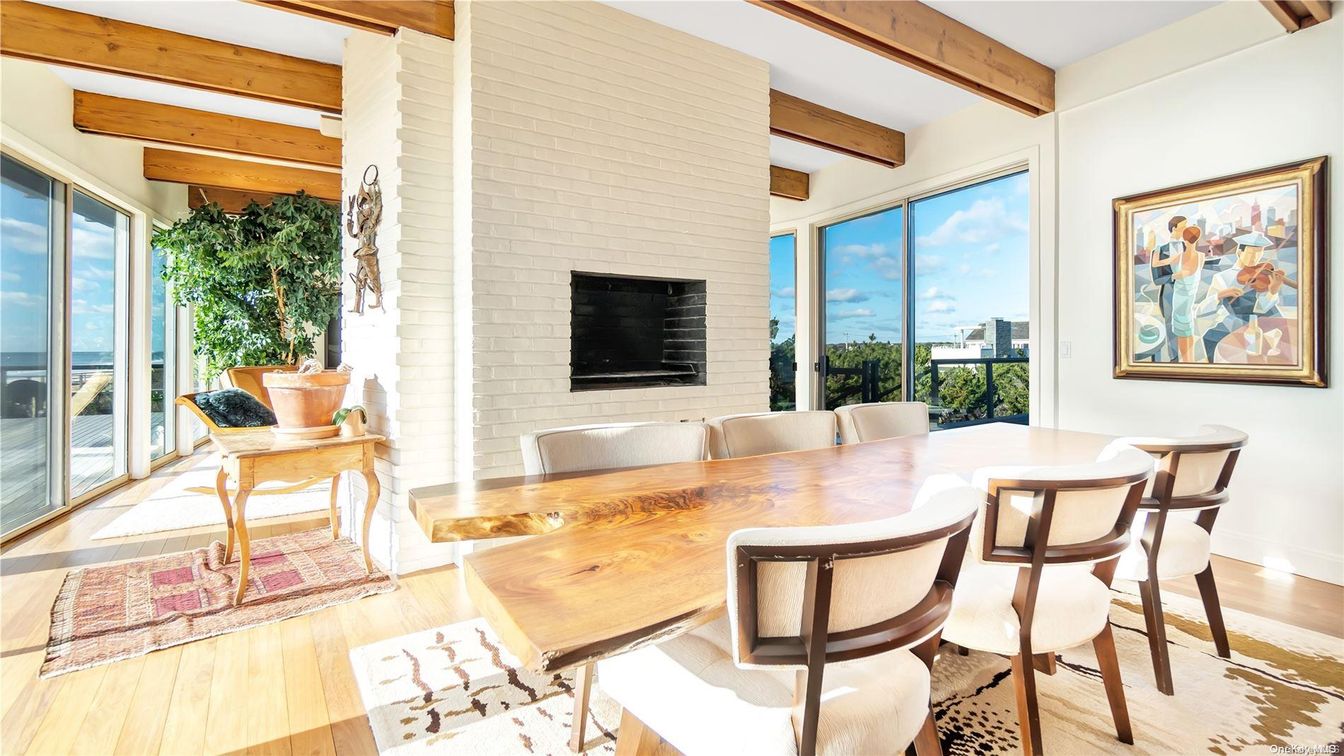 Dining room, Fireplace, Interior, Stone Walls, Water, Wooden Beams, Wood Texture Flooring