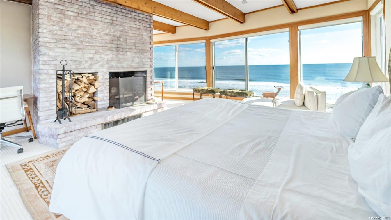Bedroom, Fireplace, Interior, Stone Walls, Water, Wooden Beams