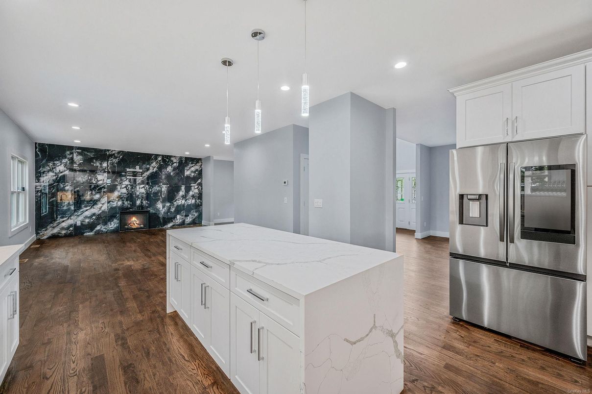 Fireplace, Interior, Kitchen, Pendant Lights, Recessed Lighting, Stainless Steel Appliances, Wood Texture Flooring