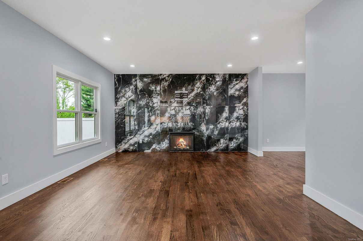 Empty room, Fireplace, Interior, Recessed Lighting, Wood Texture Flooring