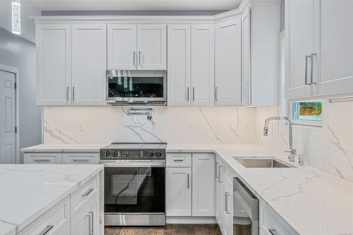 Interior, Kitchen, Marble Walls, Stainless Steel Appliances