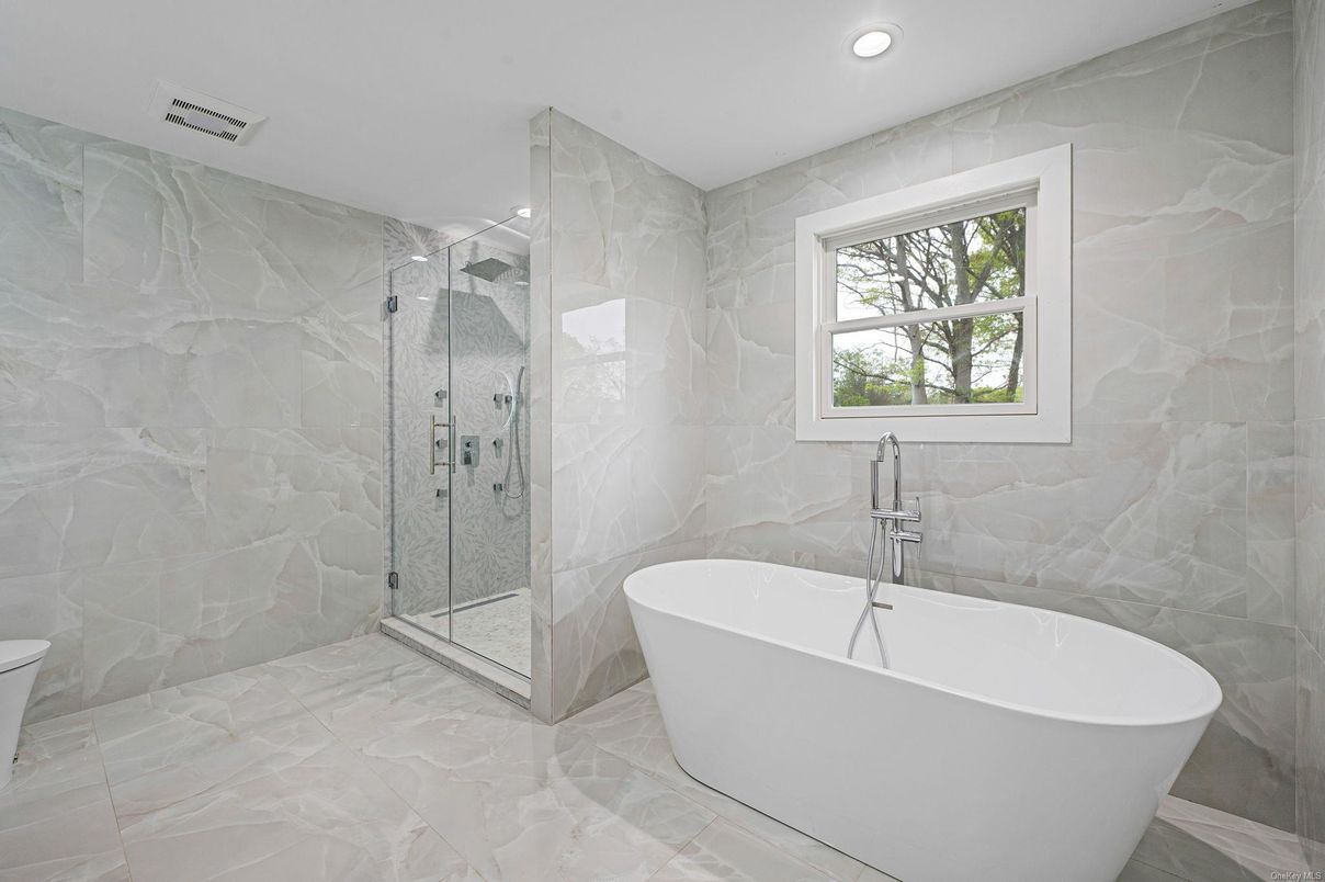 Bathroom, Free Standing Baths, Glass Shower, Interior, Marble Walls, Recessed Lighting