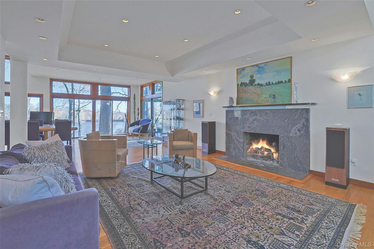 Fireplace, Interior, Living room, Piano, Recessed Lighting, Wood Texture Flooring