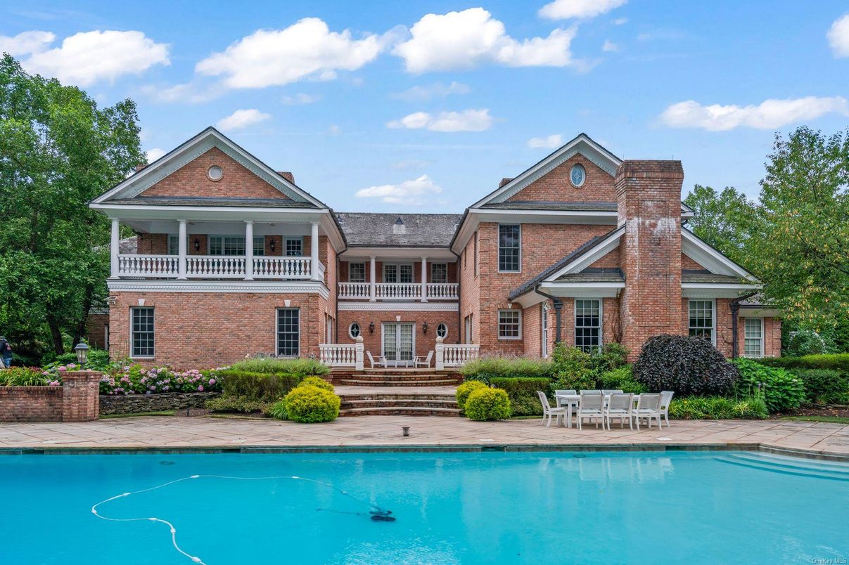 Exterior, Facade, Brick Facade, Pool, Brick Traditional
