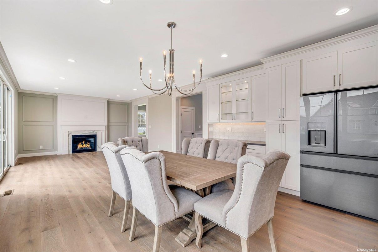 Chandelier, Dining room, Fireplace, Interior, Pendant Lights, Recessed Lighting, Wood Texture Flooring