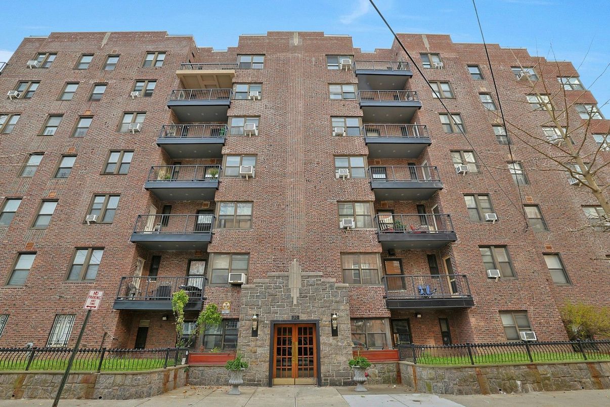 Exterior, Facade, Brick Facade, Condo Building