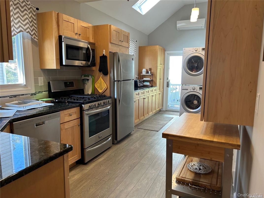 Interior, Kitchen, Pendant Lights, Stainless Steel Appliances, Washer, Wood Texture Flooring