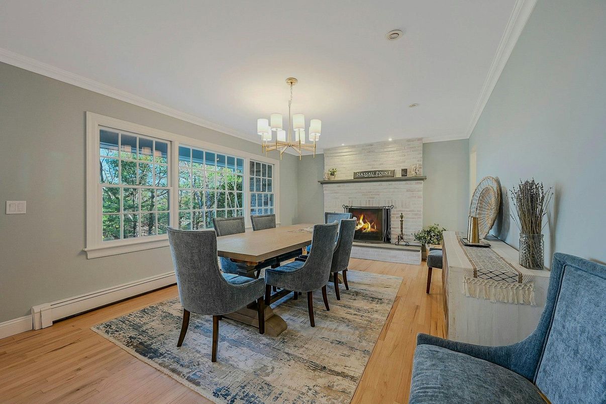Chandelier, Dining room, Fireplace, Interior, Stone Walls, Wood Texture Flooring