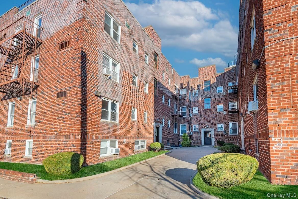 Exterior, Facade, Brick Facade, Condo Building