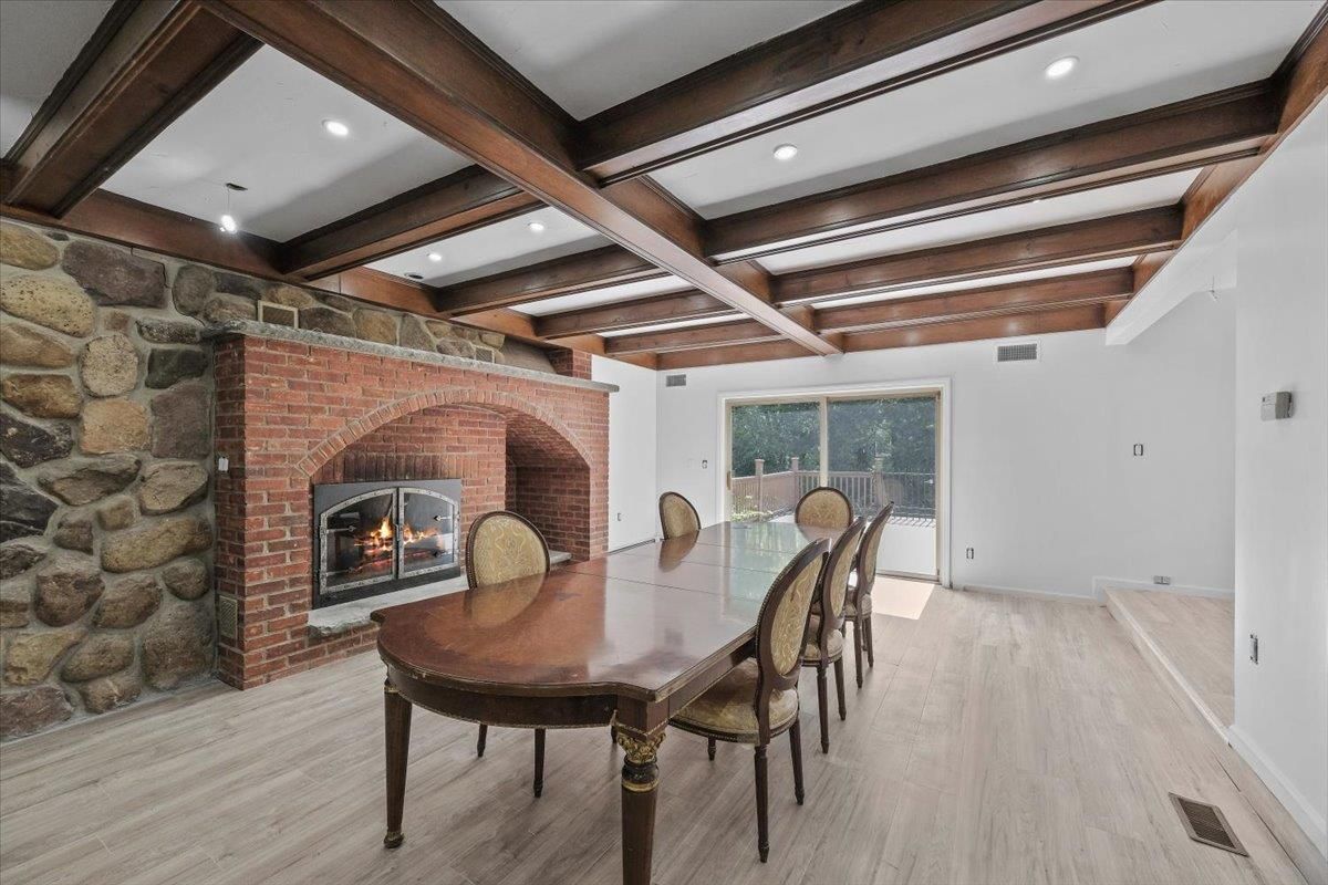 Dining room, Fireplace, Interior, Recessed Lighting, Stone Walls, Wooden Beams, Wood Texture Flooring