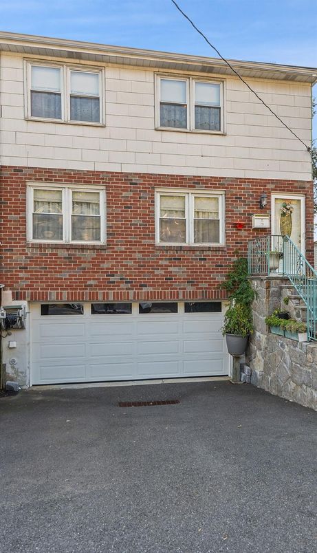 Attached, Exterior, Facade, Brick Facade, Rowhouse
