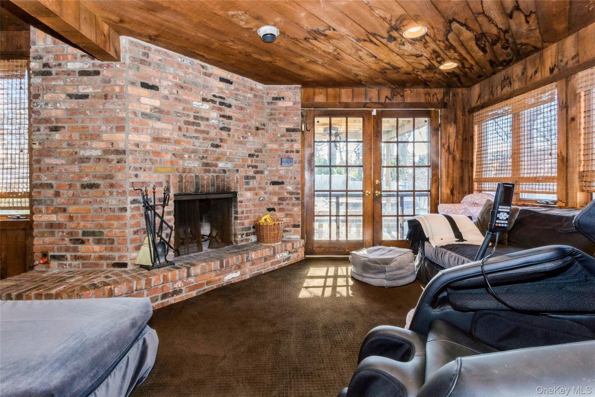 Fireplace, Interior, Living room, Recessed Lighting, Stone Walls, Wooden Ceilings