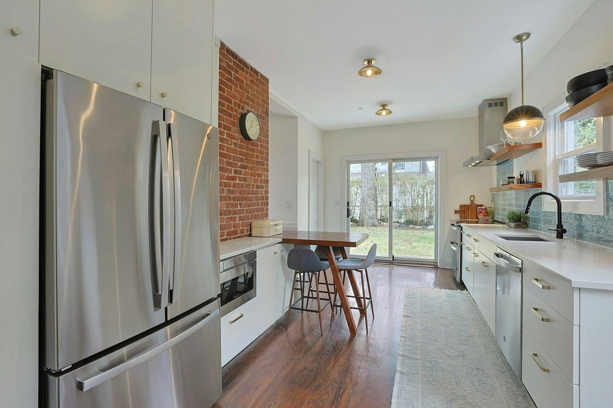 Interior, Kitchen, Pendant Lights, Stainless Steel Appliances, Stone Walls, Wood Texture Flooring