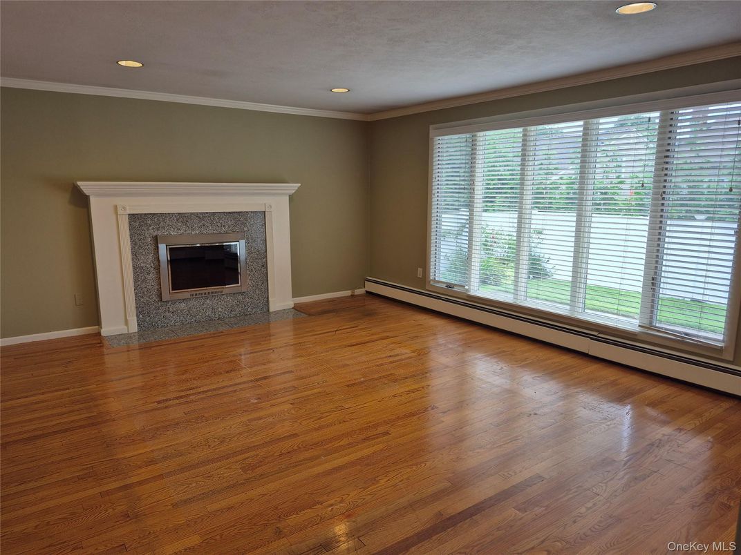 Empty room, Fireplace, Interior, Recessed Lighting, Wood Texture Flooring