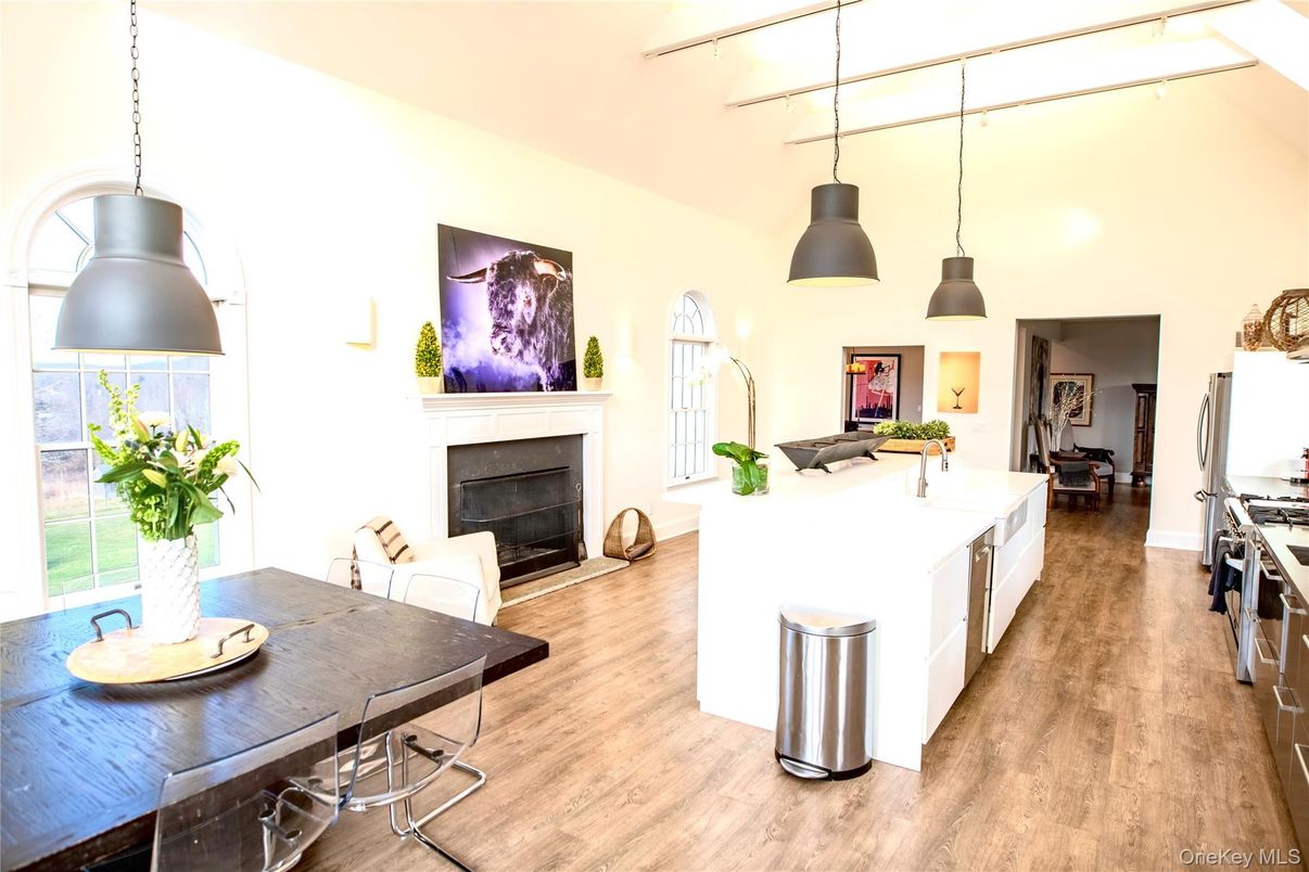 Dining room, Fireplace, Interior, Kitchen, Pendant Lights, Wood Texture Flooring