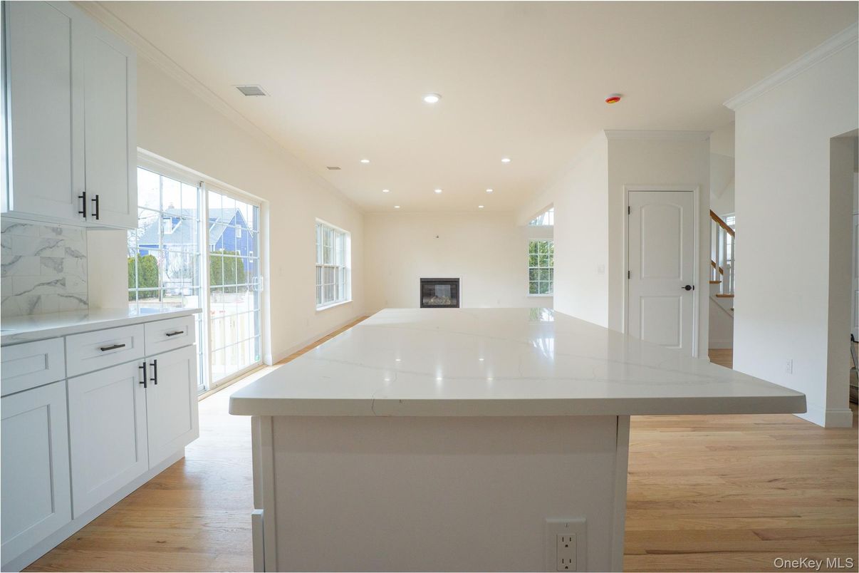 Fireplace, Interior, Kitchen, Recessed Lighting, Wood Texture Flooring