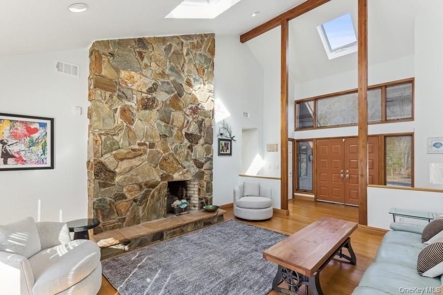 Fireplace, Interior, Living room, Recessed Lighting, Stone Walls, Wooden Beams, Wood Texture Flooring