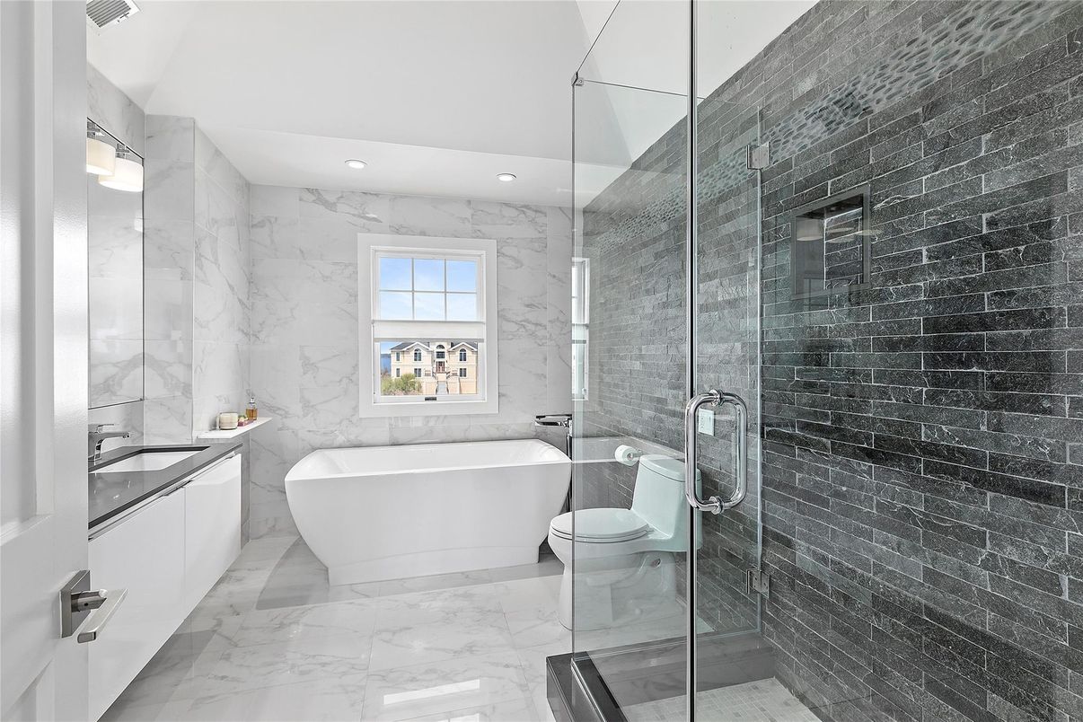 Bathroom, Dual Sink Vanities, Free Standing Baths, Glass Shower, Interior, Marble, Marble Walls, Recessed Lighting