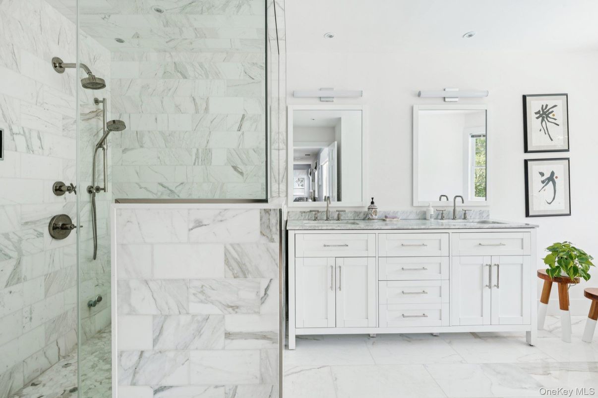 Bathroom, Dual Sink Vanities, Glass Shower, Interior, Marble, Marble Walls, Recessed Lighting