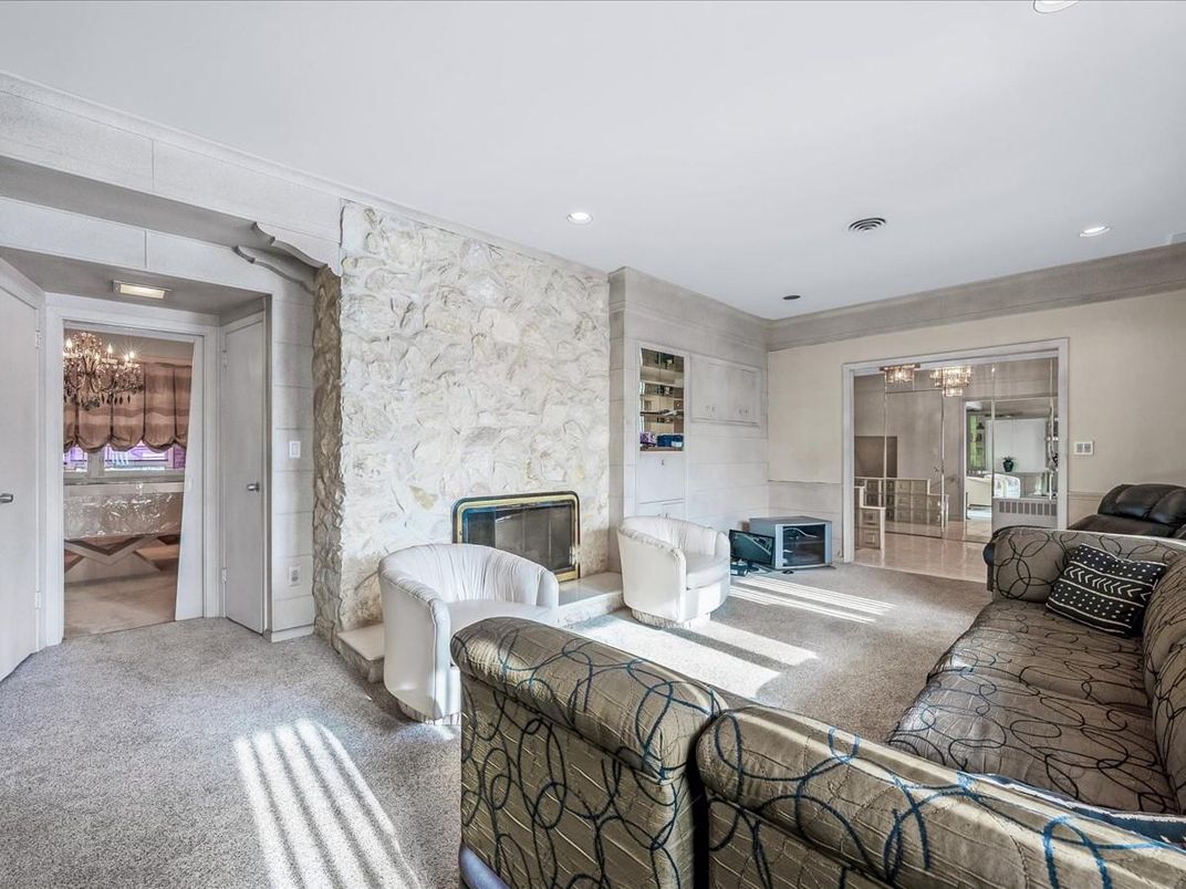 Chandelier, Fireplace, Interior, Living room, Recessed Lighting, Stone Walls