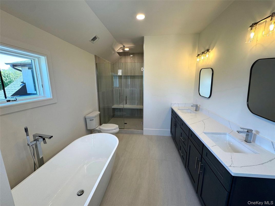Bathroom, Dual Sink Vanities, Free Standing Baths, Glass Shower, Interior, Recessed Lighting