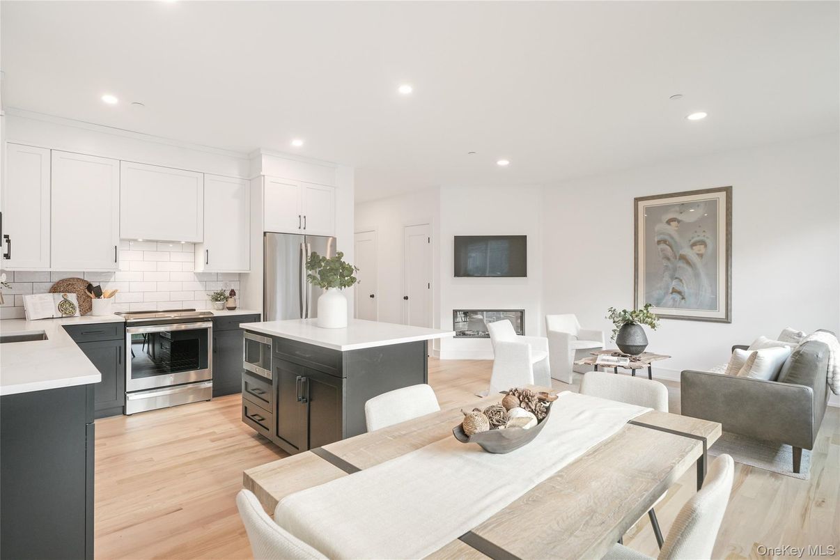 Dining room, Interior, Kitchen, Living room, Recessed Lighting, Stainless Steel Appliances, Wood Texture Flooring