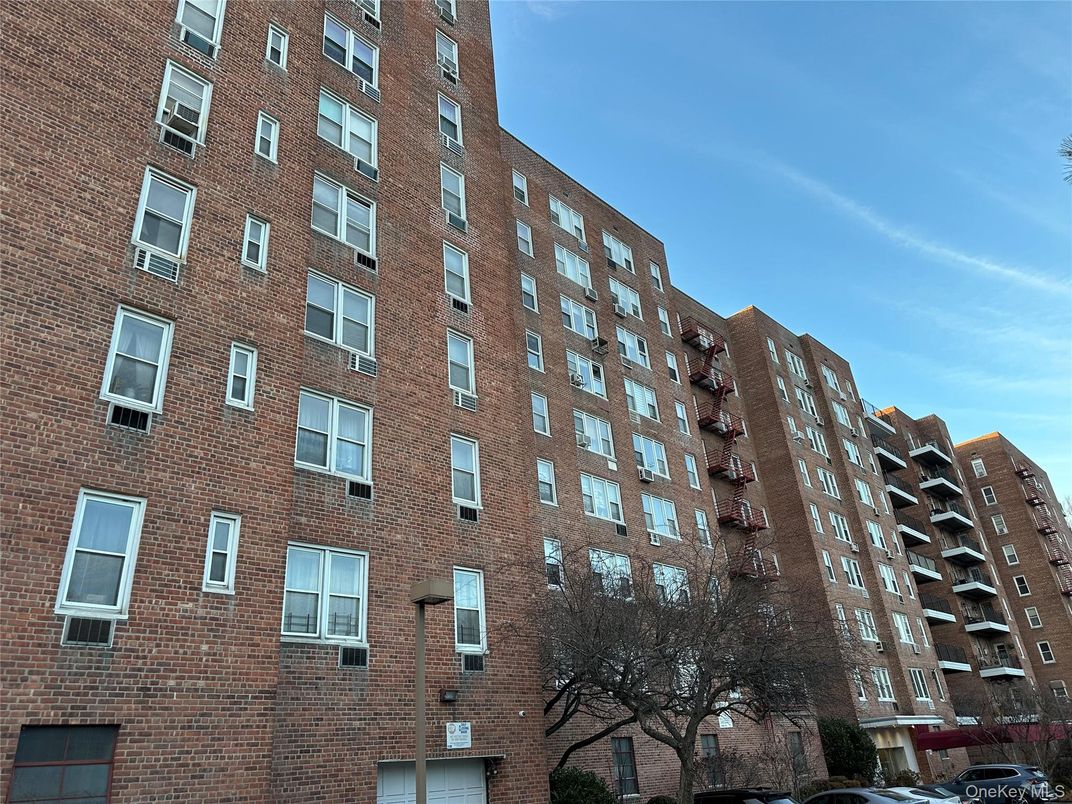 Exterior, Facade, Brick Facade, Condo Building