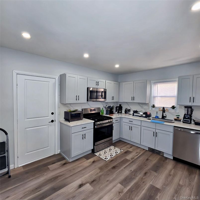 Interior, Kitchen, Recessed Lighting, Stainless Steel Appliances, Wood Texture Flooring