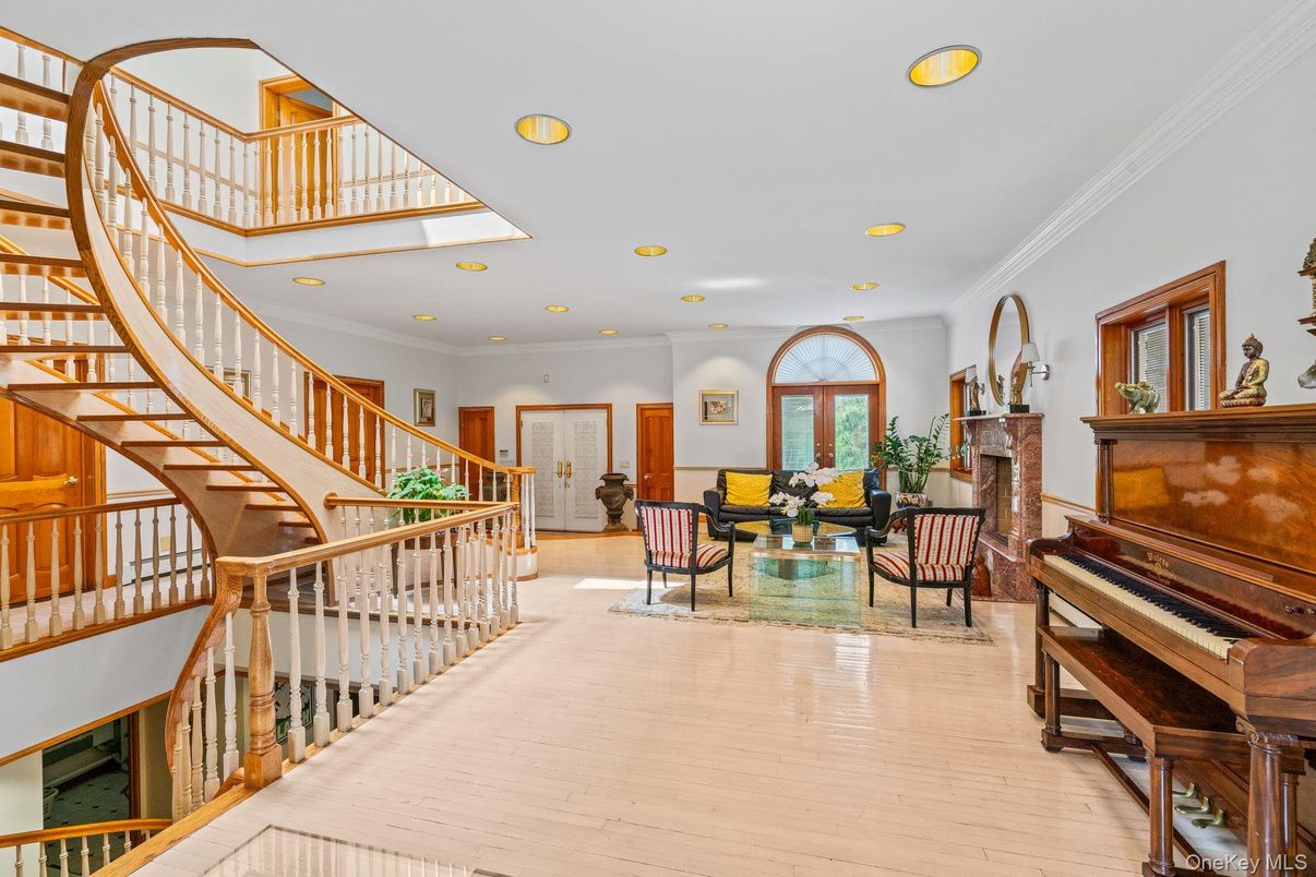 Fireplace, Interior, Living room, Piano, Recessed Lighting, Wood Texture Flooring