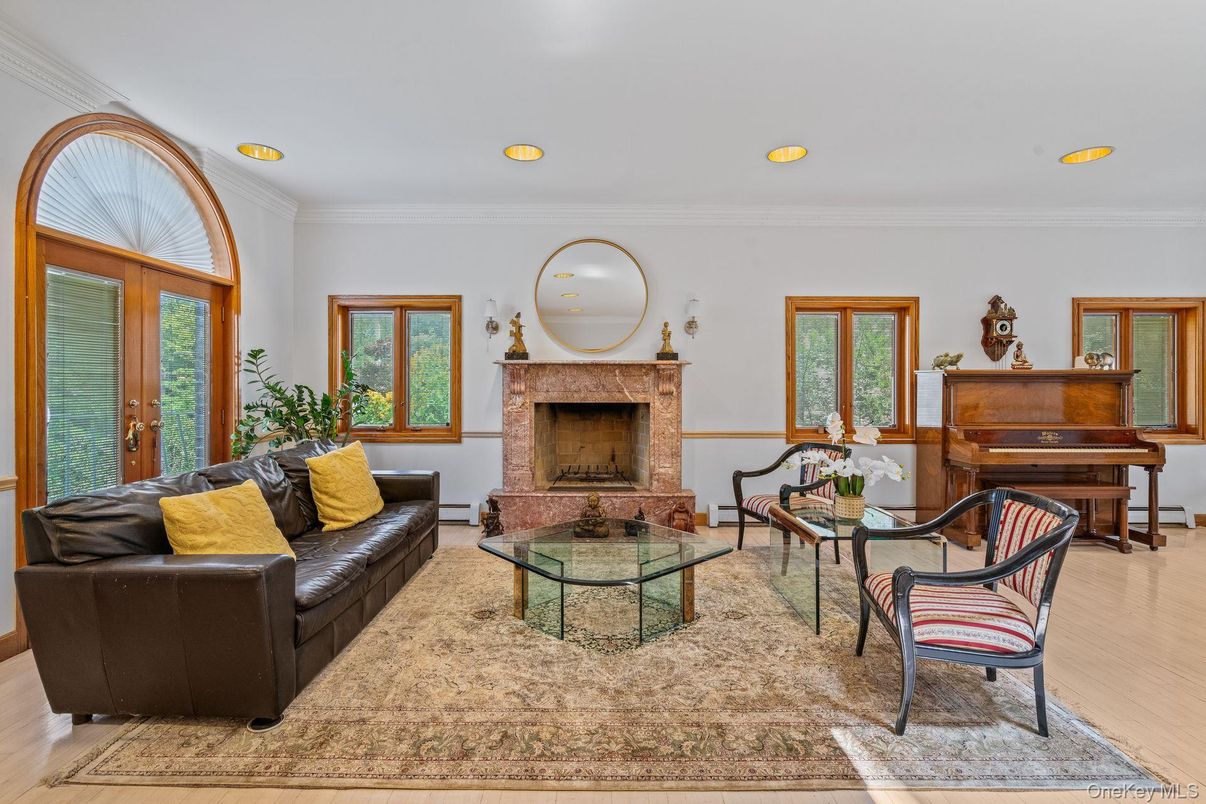 Fireplace, Interior, Living room, Piano, Recessed Lighting, Wood Texture Flooring