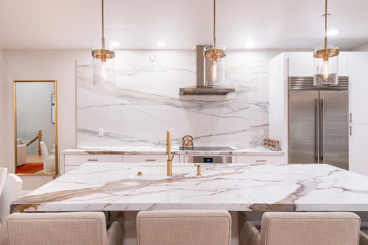 Interior, Kitchen, Marble Walls, Pendant Lights, Recessed Lighting, Stainless Steel Appliances