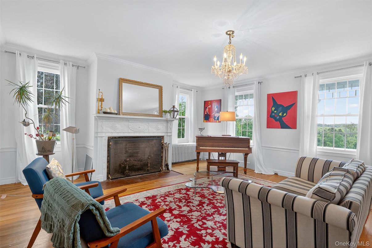 Chandelier, Fireplace, Interior, Living room, Piano, Wood Texture Flooring