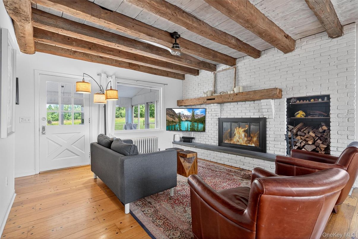 Fireplace, Interior, Living room, Pendant Lights, Stone Walls, Wooden Beams, Wood Texture Flooring