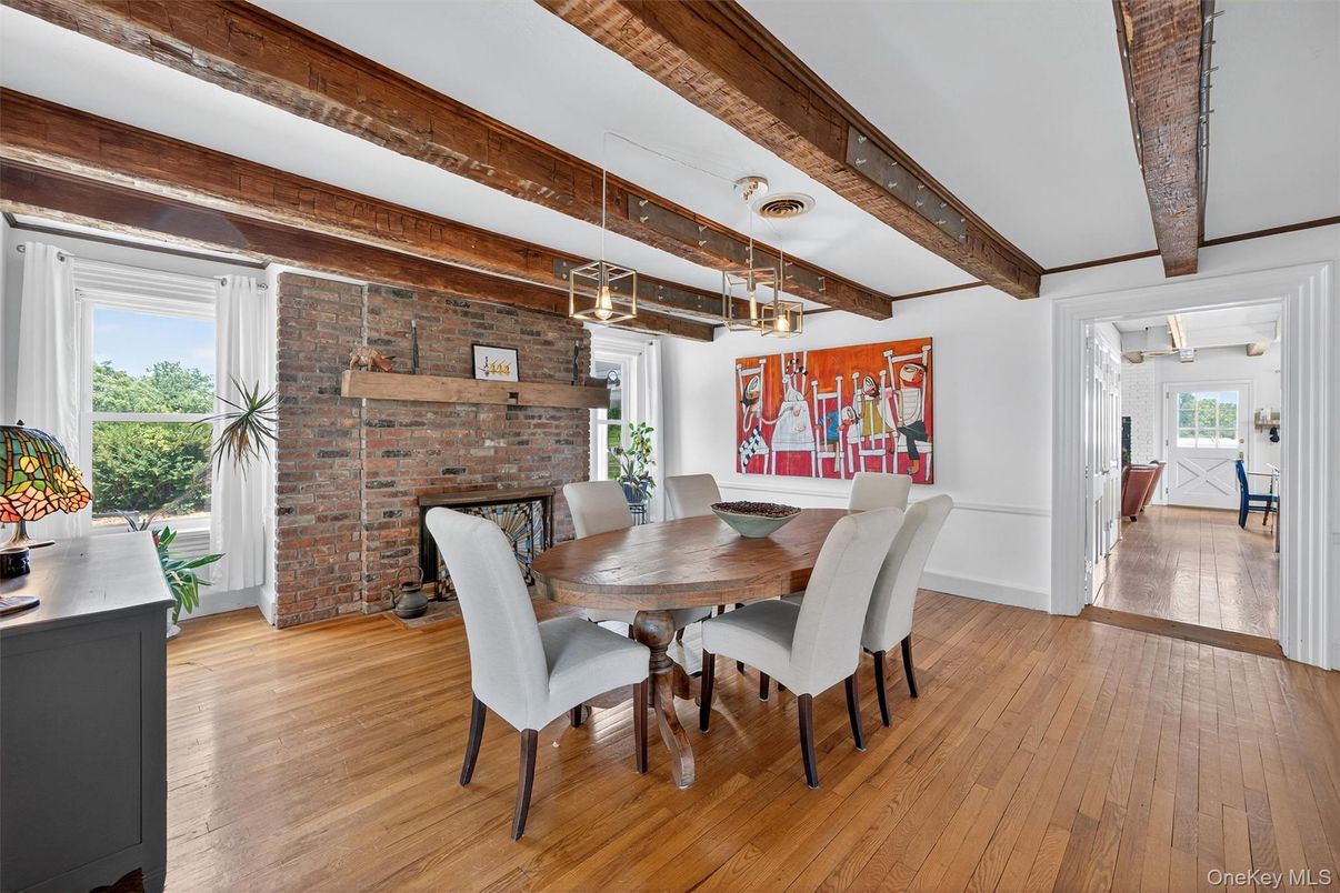 Dining room, Fireplace, Interior, Pendant Lights, Stone Walls, Wooden Beams, Wood Texture Flooring
