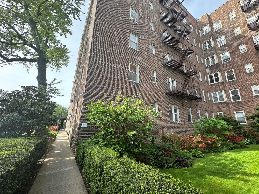 Exterior, Facade, Brick Facade, Condo Building