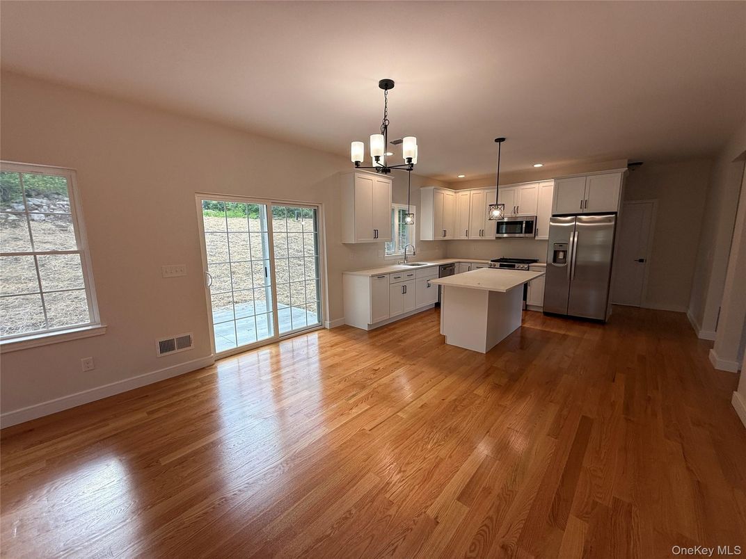 Chandelier, Interior, Kitchen, Pendant Lights, Recessed Lighting, Stainless Steel Appliances, Wood Texture Flooring