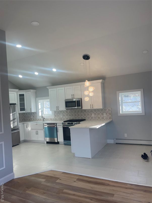 Interior, Kitchen, Pendant Lights, Recessed Lighting, Stainless Steel Appliances, Wood Texture Flooring