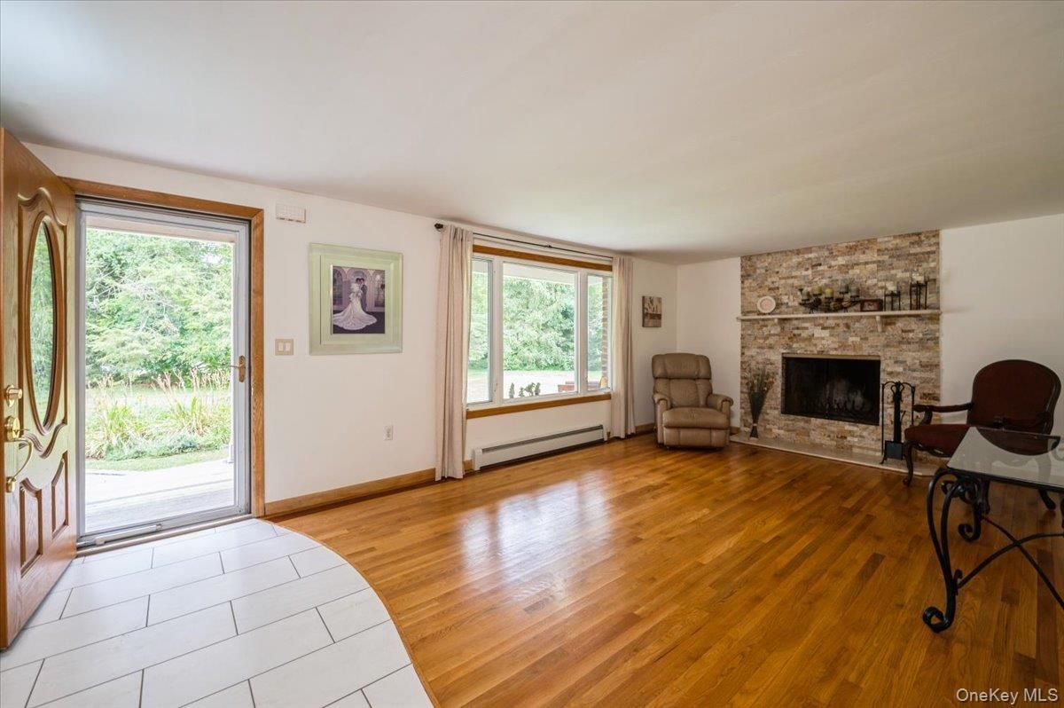 Empty room, Fireplace, Interior, Stone Walls, Wood Texture Flooring