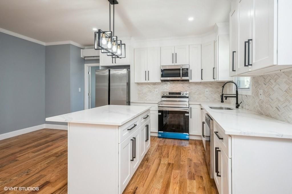 Interior, Kitchen, Pendant Lights, Recessed Lighting, Stainless Steel Appliances, Wood Texture Flooring
