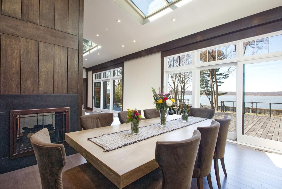 Dining room, Fireplace, Interior, Recessed Lighting, Water, Wood Texture Flooring