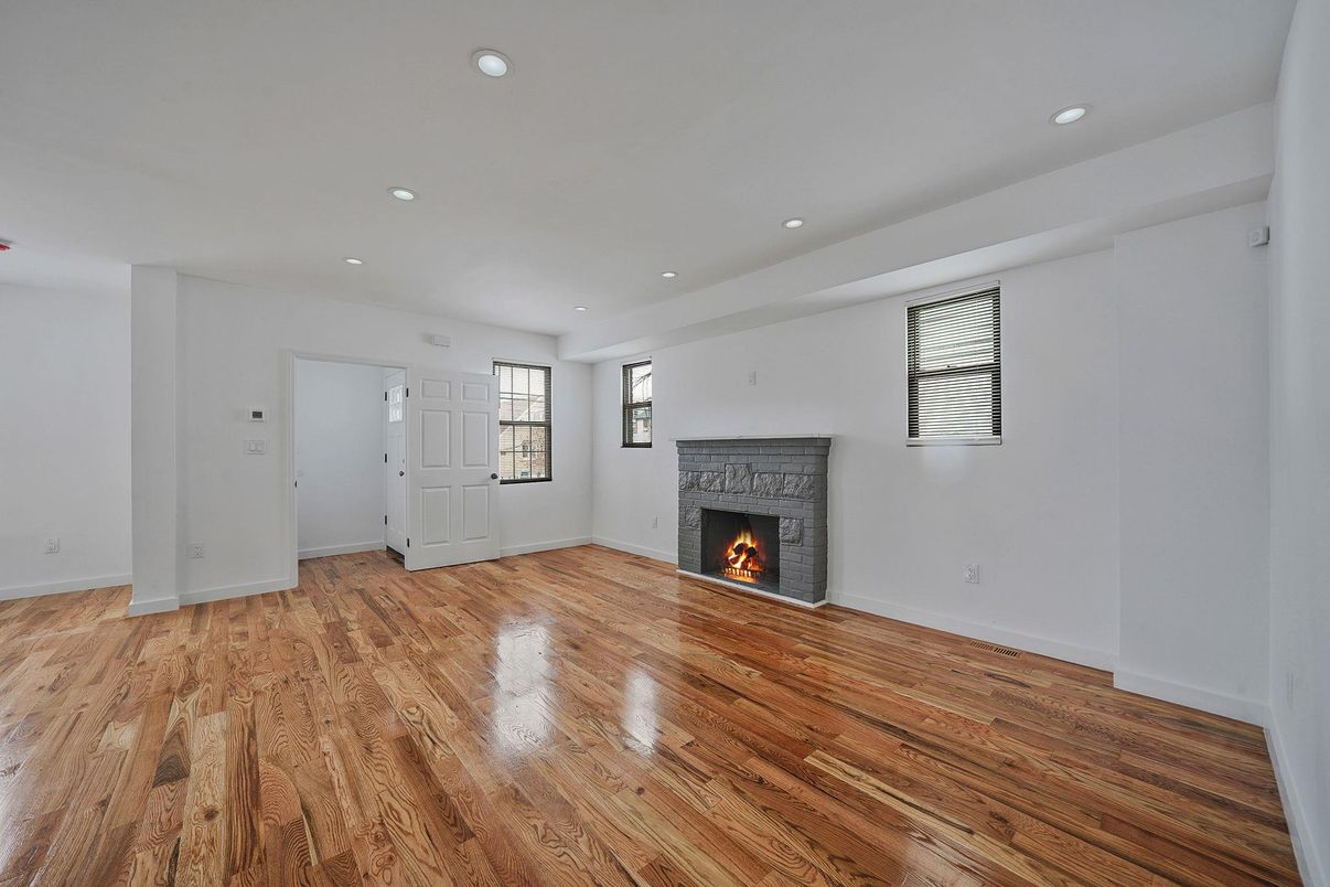 Empty room, Fireplace, Interior, Recessed Lighting, Wood Texture Flooring