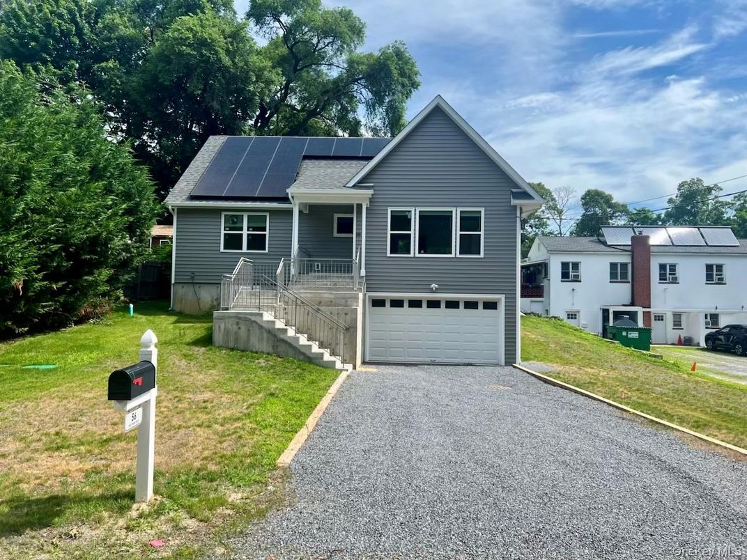 Attached, Exterior, Facade, Solar Panels, Raised Ranch