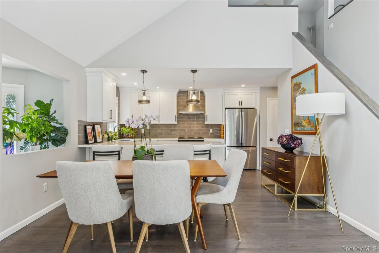 Dining room, Interior, Kitchen, Pendant Lights, Recessed Lighting, Stainless Steel Appliances, Wood Texture Flooring