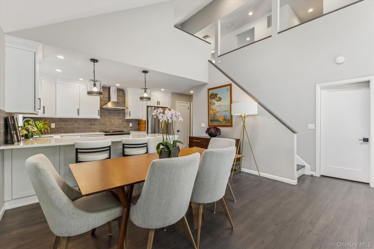 Dining room, Interior, Kitchen, Pendant Lights, Recessed Lighting, Stainless Steel Appliances, Wood Texture Flooring